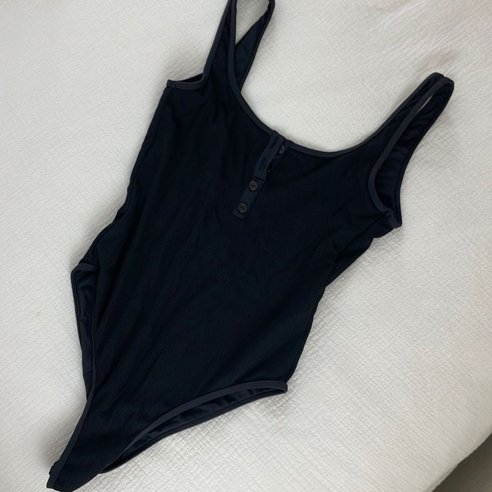 L space black one piece